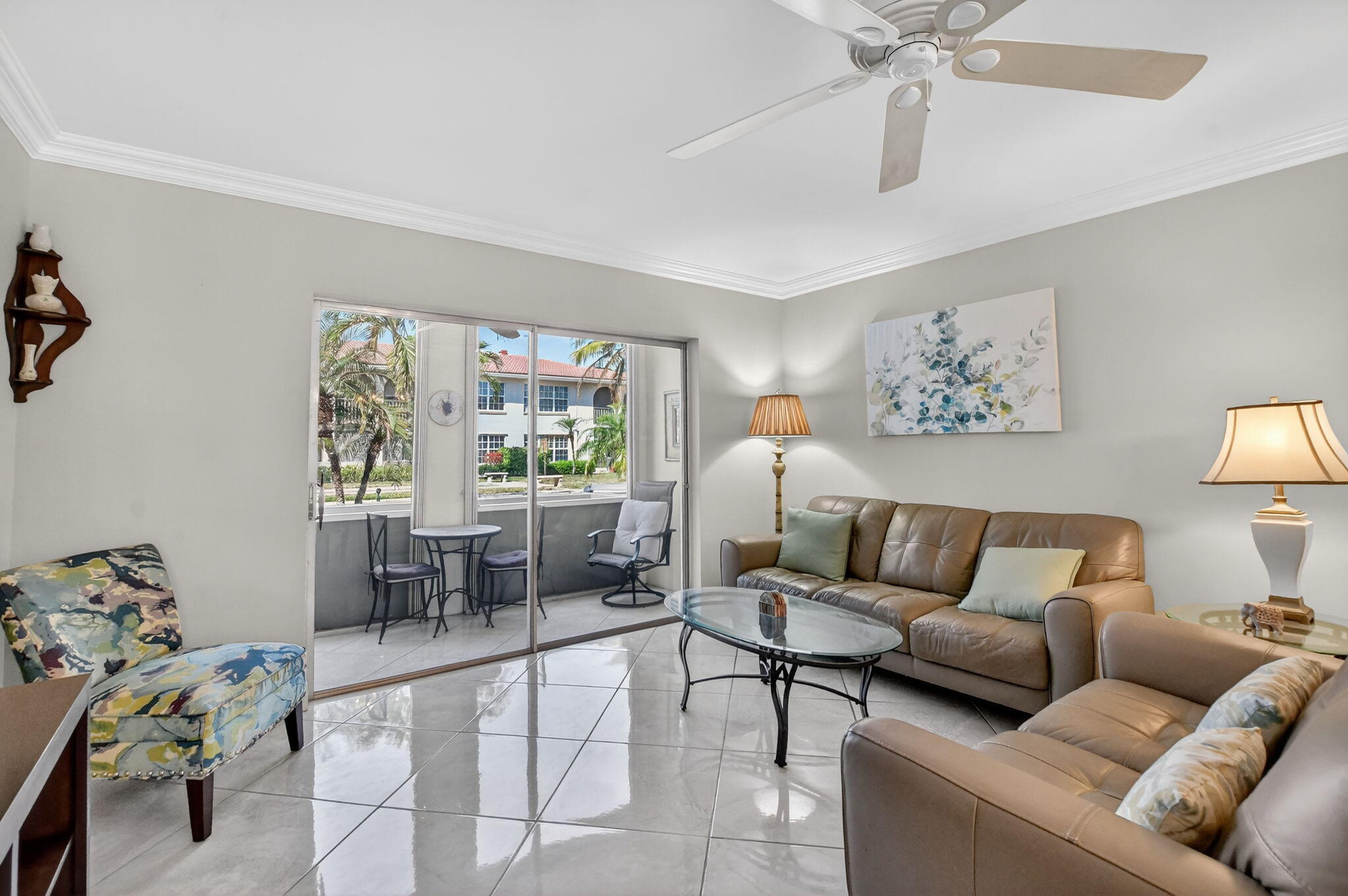 250 Northeast 20th Street, Unit 1170 Boca Raton, FL 33431 - Photo 13 of 40 a living room with furniture and a large window