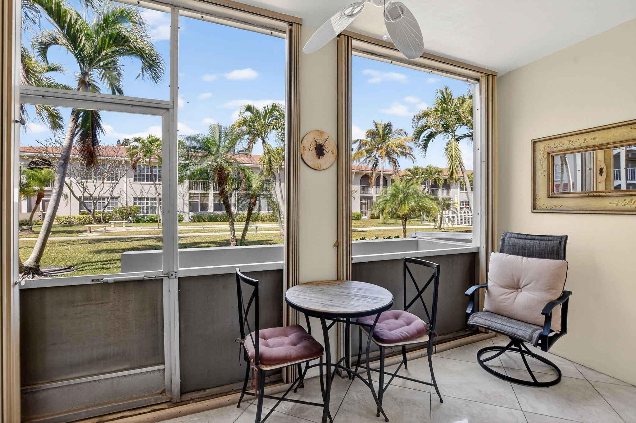 250 Northeast 20th Street, Unit 1170 Boca Raton, FL 33431 - Photo 26 of 40 a view of a dining room with furniture a rug and wooden floor