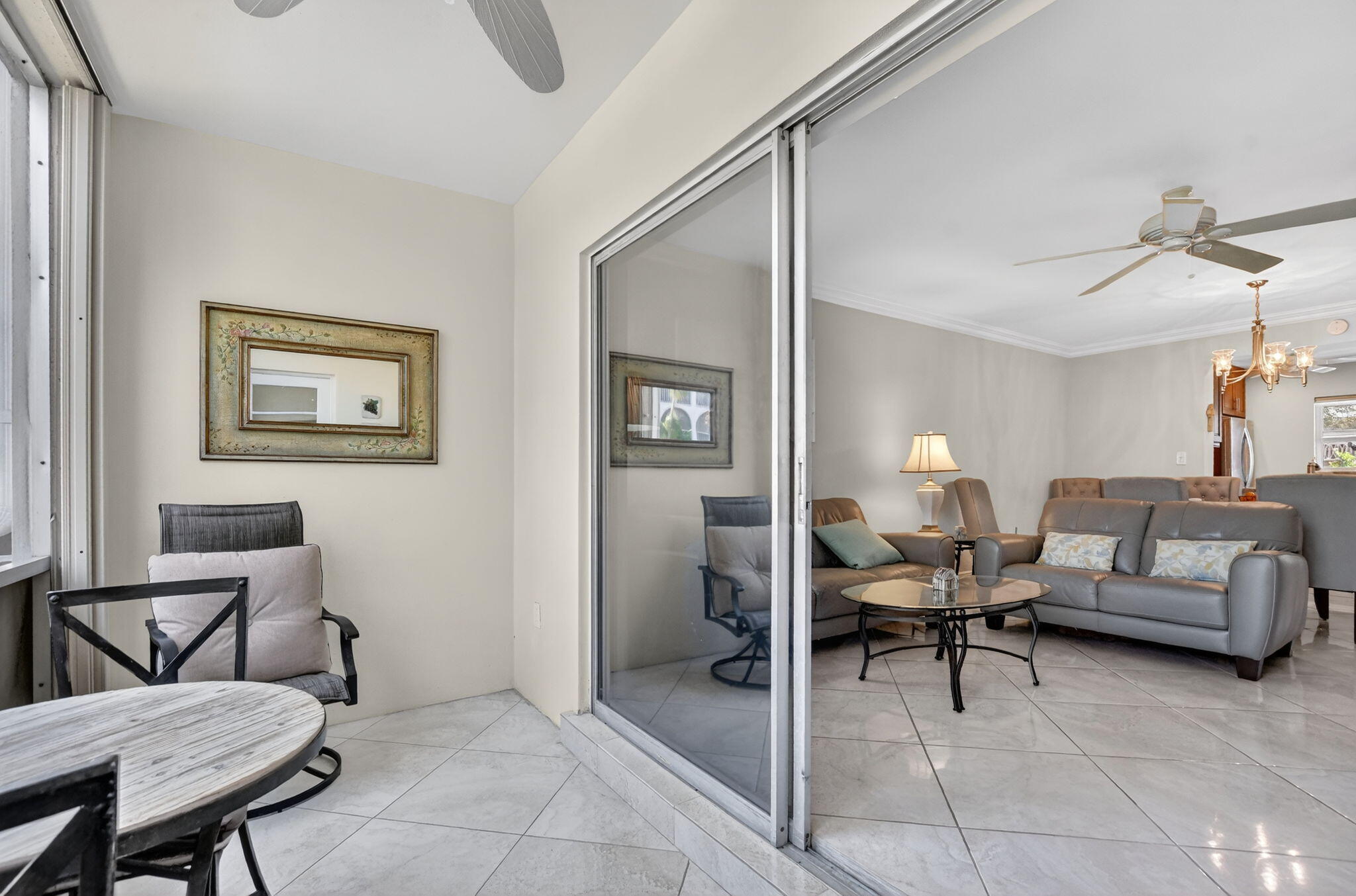 250 Northeast 20th Street, Unit 1170 Boca Raton, FL 33431 - Photo 27 of 40 a living room with furniture and a chair