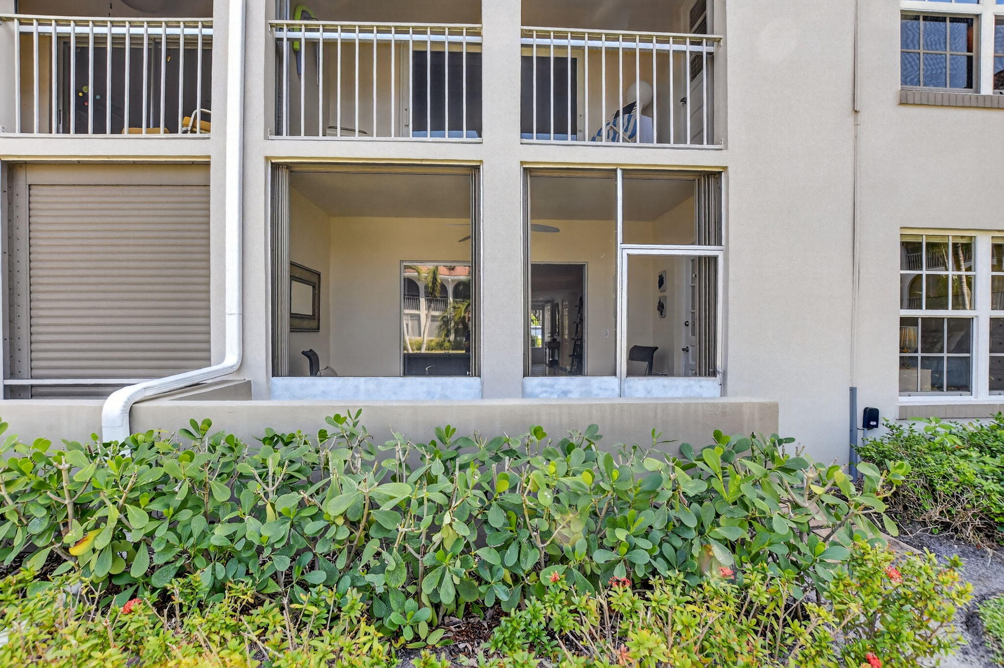 250 Northeast 20th Street, Unit 1170 Boca Raton, FL 33431 - Photo 30 of 40 a view of a house with potted plants