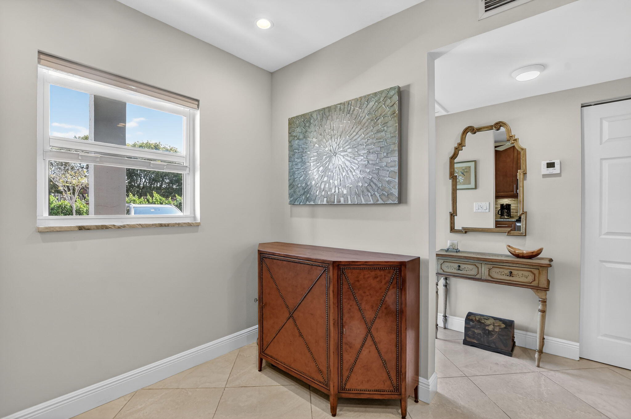 250 Northeast 20th Street, Unit 1170 Boca Raton, FL 33431 - Photo 8 of 40 a view of an entryway with fireplace