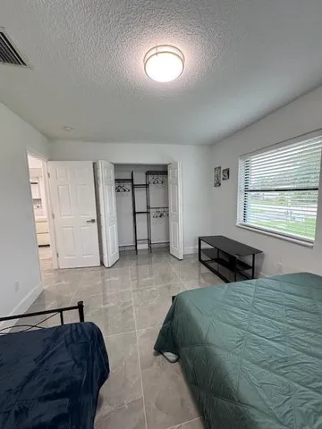 a living room with furniture and a coffee table