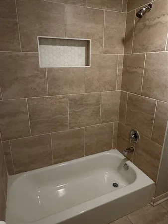 a bathroom with a bathtub
