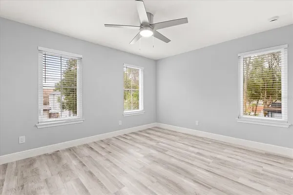 a view of an empty room with a window