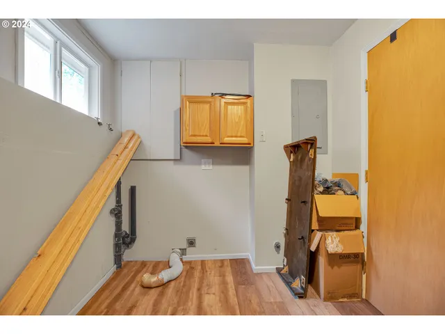 a view of balcony with wooden floor