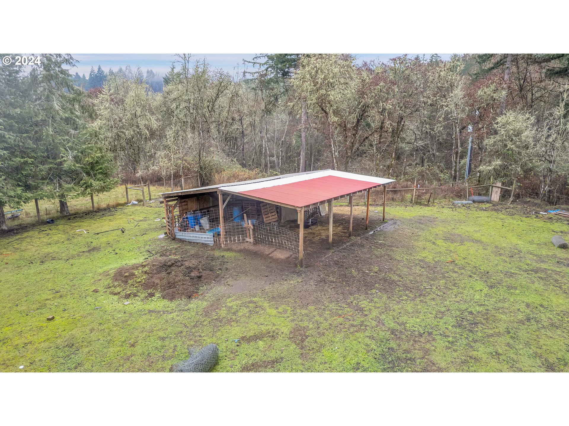 22715 Southwest Eagle Point Road Sheridan, OR 97378 - Photo 44 of 44 a backyard of a house with table and chairs