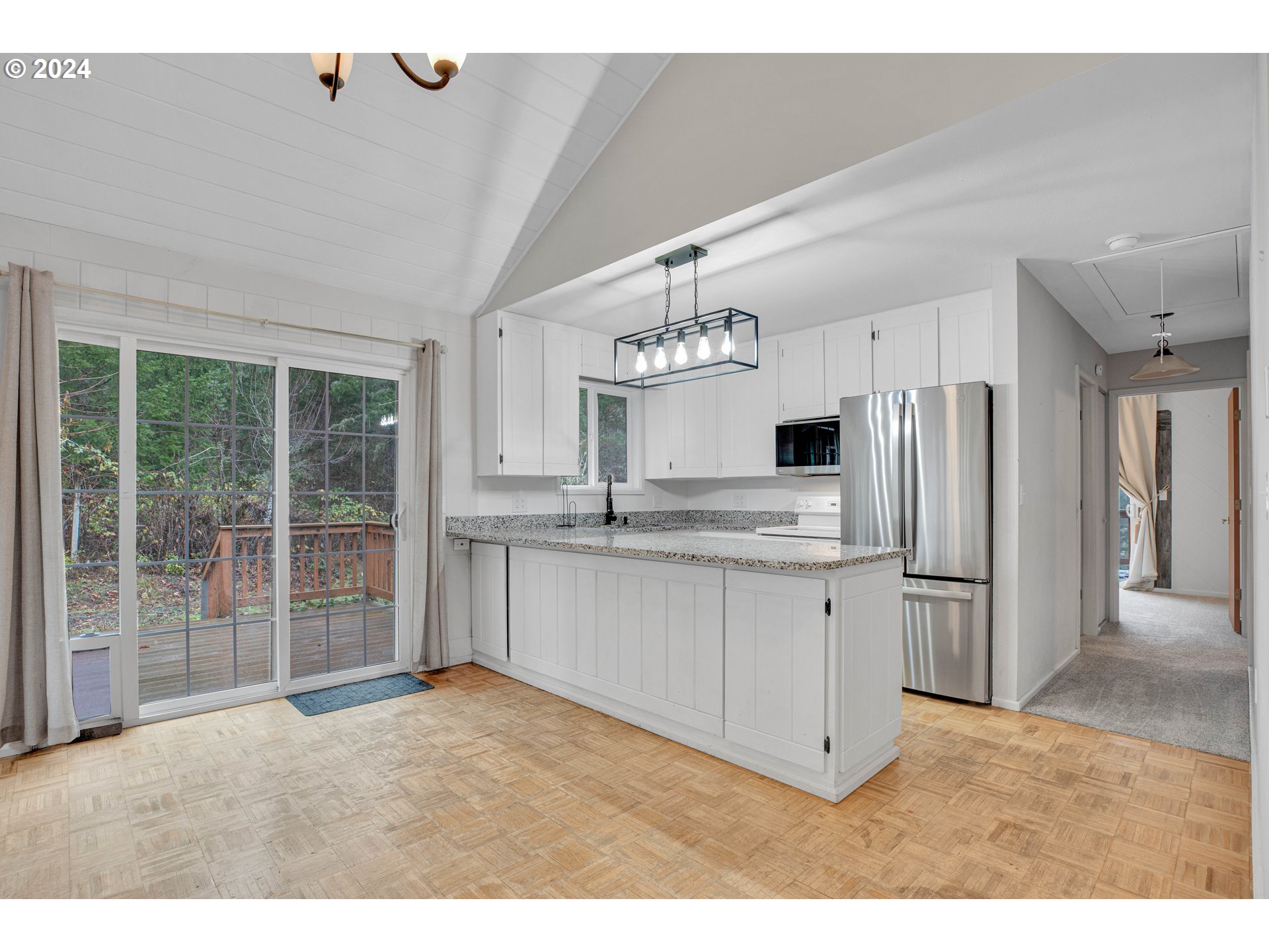 22715 Southwest Eagle Point Road Sheridan, OR 97378 - Photo 6 of 44 a kitchen with refrigerator cabinets and a sink