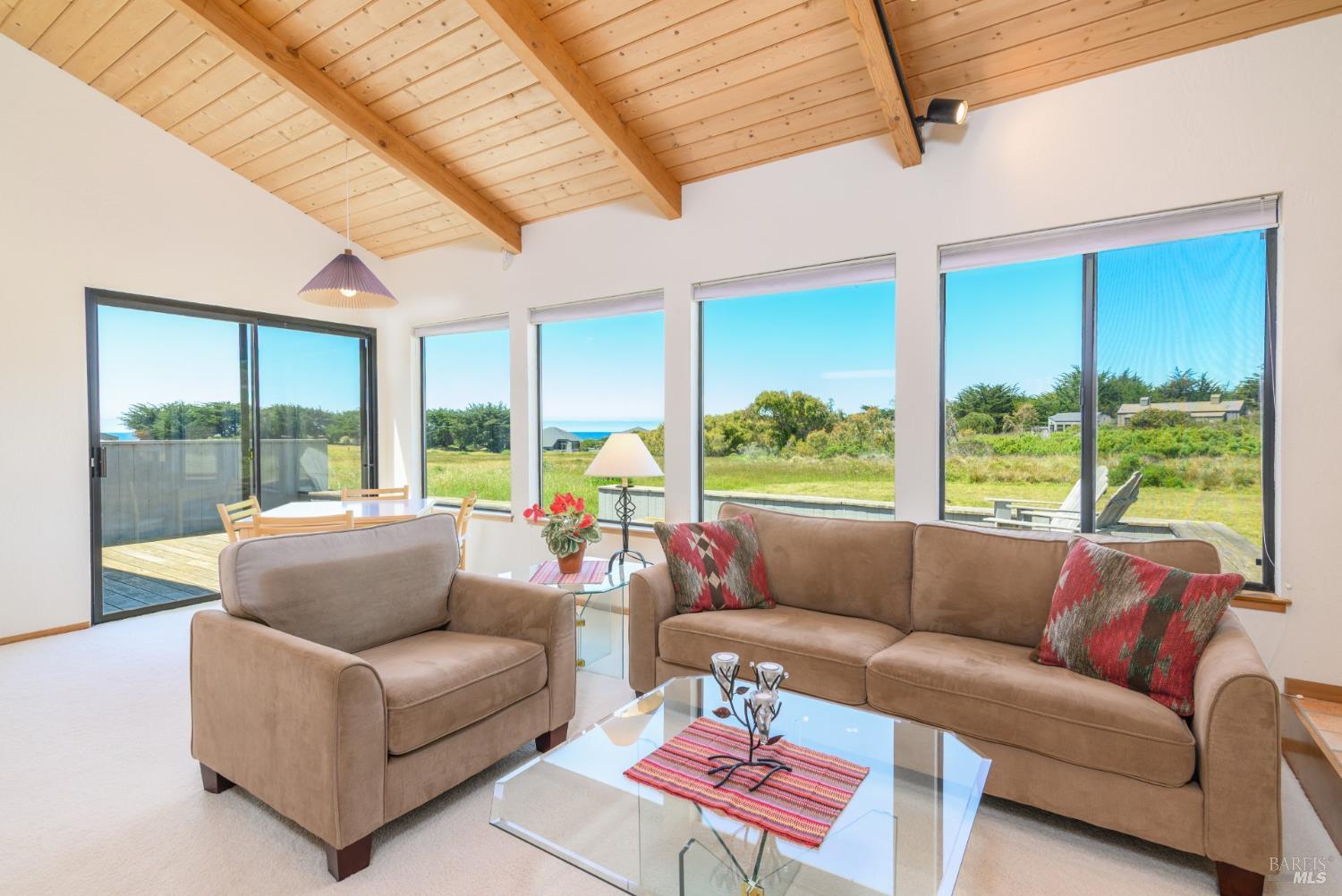 267 Sea Stack The Sea Ranch, CA 95497 - Photo 1 of 35 a living room with furniture and a large window