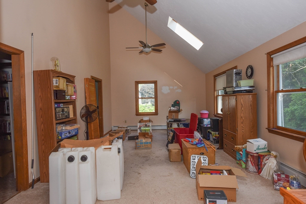 179 County Road Ashby, MA 01431 - Photo 8 of 33 a living room with furniture a window and a flat screen tv