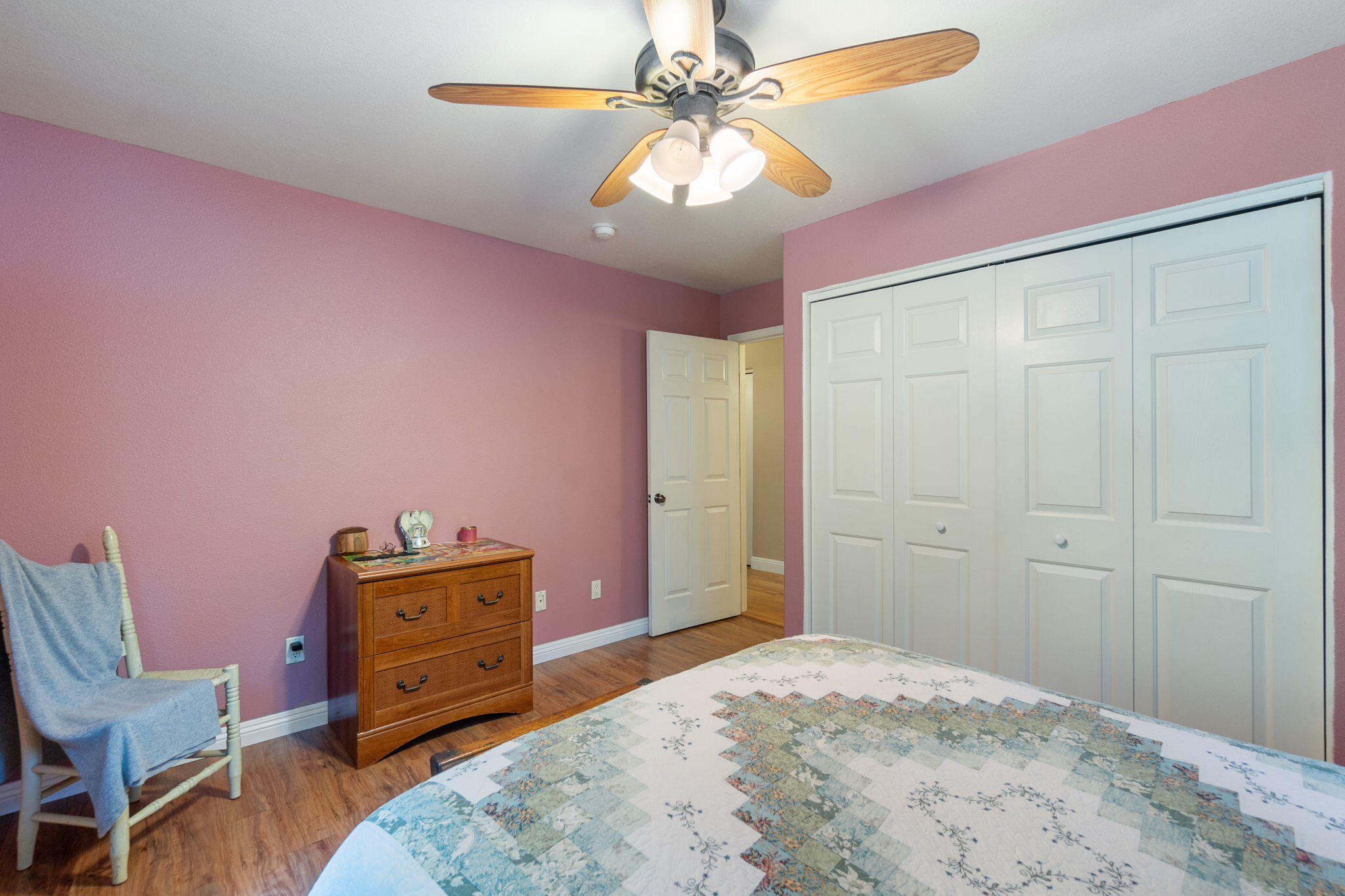 30303 Oak Run To Fern Road Whitmore, CA 96096 - Photo 31 of 75 a bedroom with a bed and a chandelier