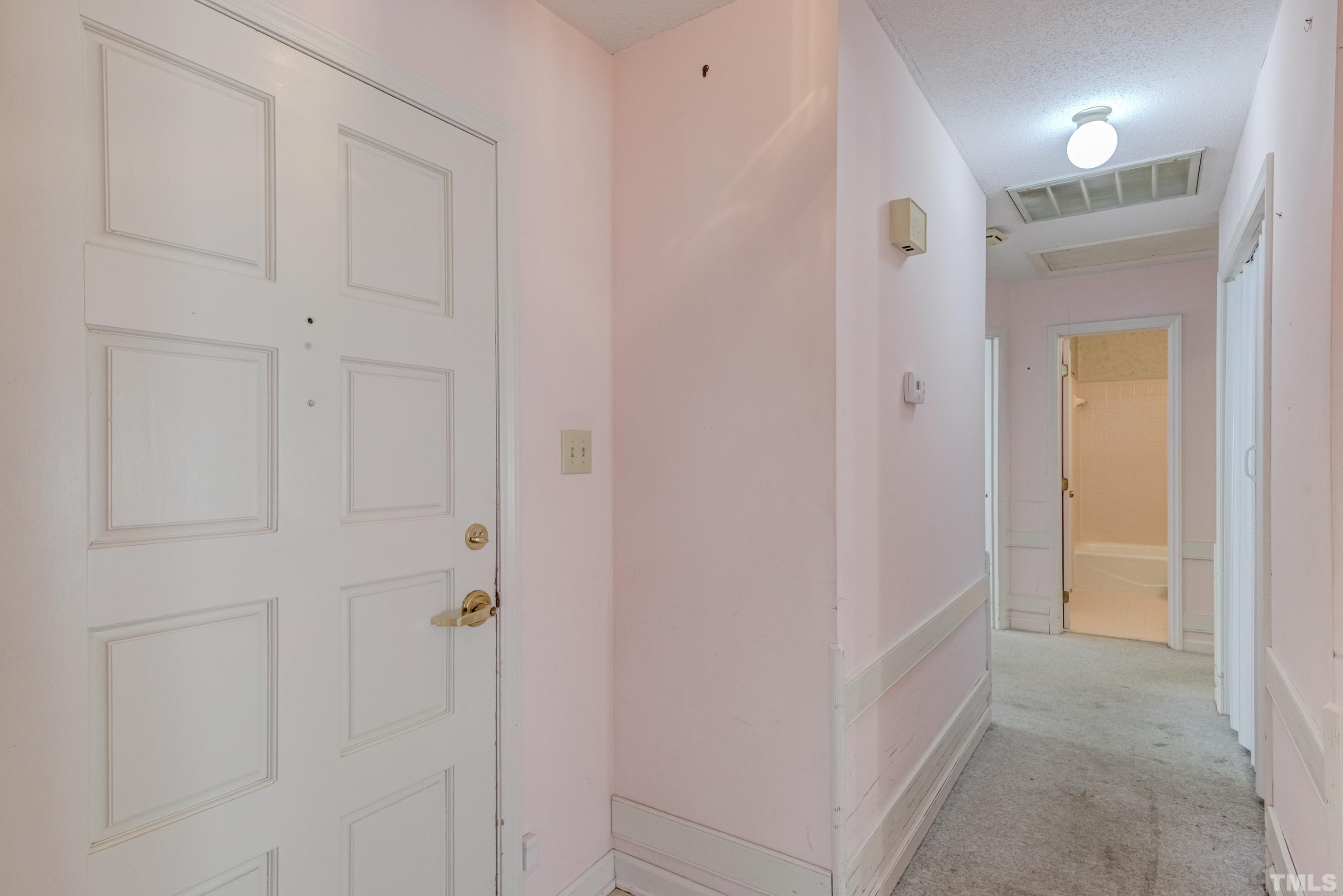 5869 Branchwood Road Raleigh, NC 27609 - Photo 35 of 35 a view of a hallway with closet area