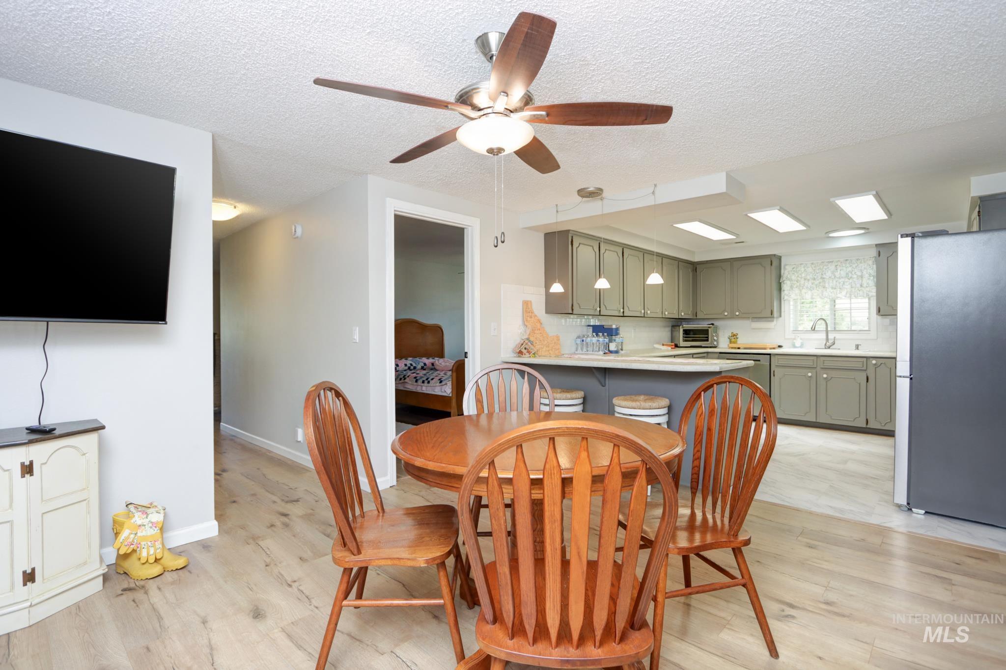 2528 Waterwheel Road Emmett, ID 83617 - Photo 26 of 50 Light grey walls complemented by wood-finish flooring