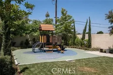 a view of a park with a slide