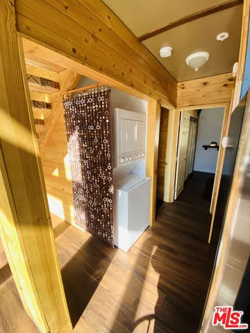 a bedroom with a bed and a chair