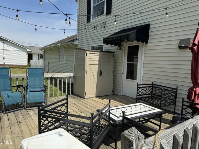 a backyard of a house with seating space