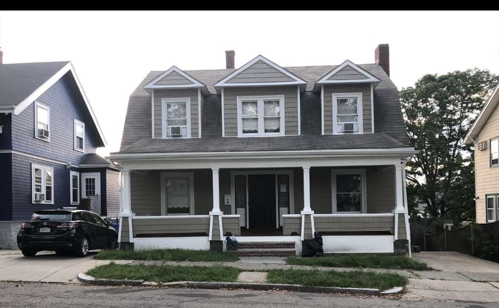 43 Loring Road Winthrop, MA 02152 - Photo 1 of 21 a front view of a house with a yard