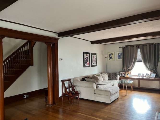 43 Loring Road Winthrop, MA 02152 - Photo 15 of 21 a living room with furniture and a wooden floor