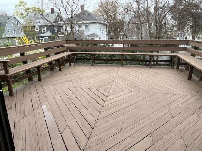 43 Loring Road Winthrop, MA 02152 - Photo 20 of 21 a backyard of a house with barbeque oven and outdoor seating