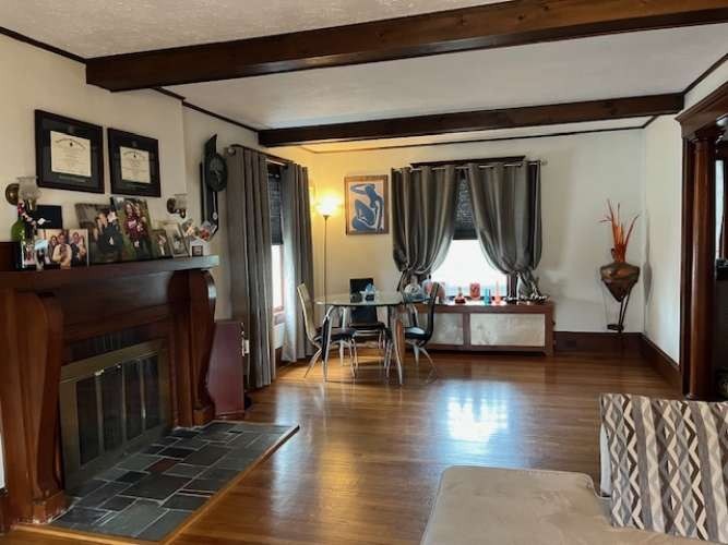 43 Loring Road Winthrop, MA 02152 - Photo 6 of 21 a view of a livingroom with furniture and a window