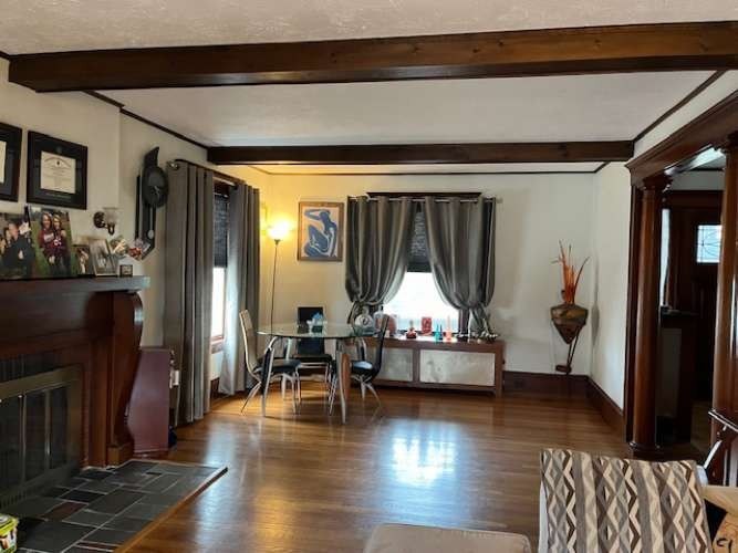 43 Loring Road Winthrop, MA 02152 - Photo 10 of 21 a living room with fireplace furniture and a wooden floor