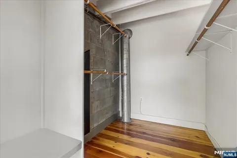 a view of an empty walk in closet