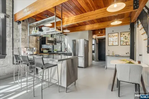 a dining space with furniture and a table