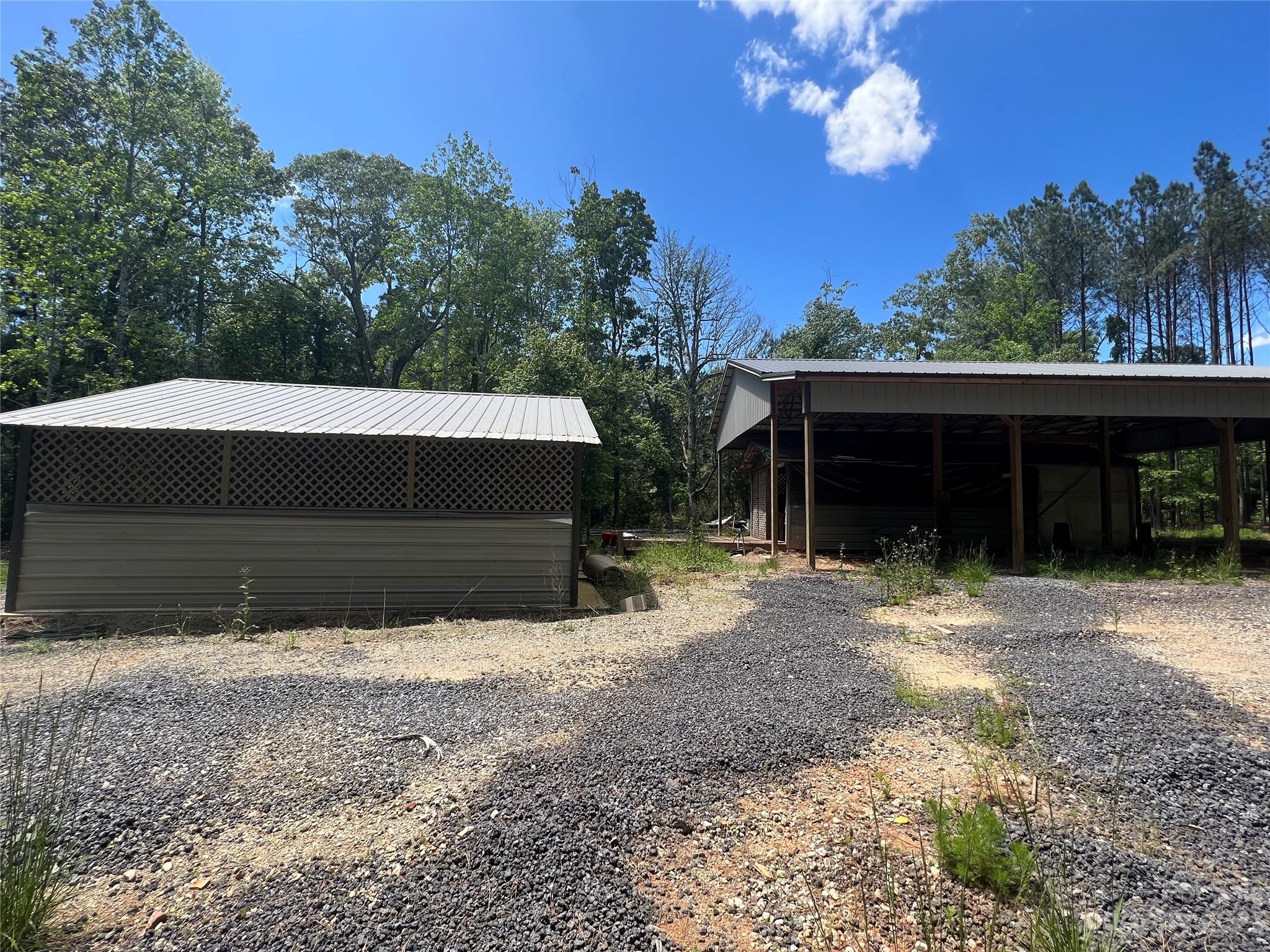 6553 Sherrills Ford Road Catawba, NC 28609 - Photo 6 of 10 a front view of house with yard and trees in the background