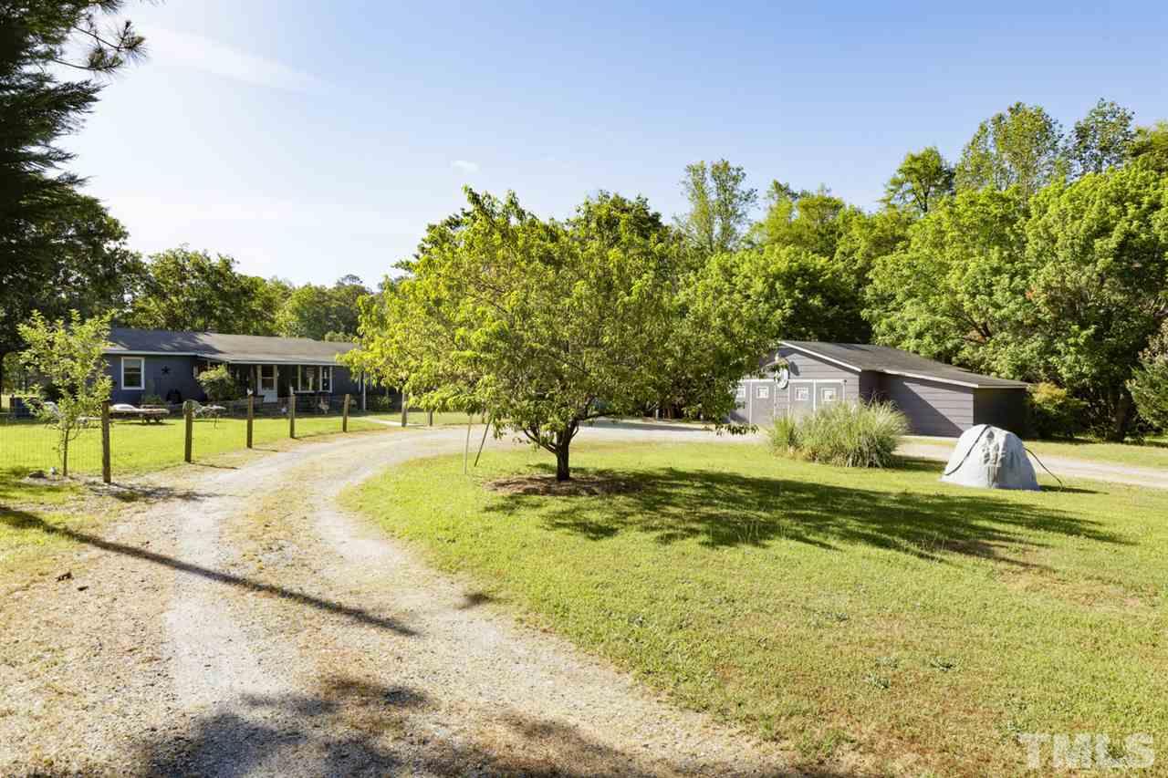 1481 Phillips Road Dunn, NC 28334 - Photo 1 of 30 a view of a swimming pool with a patio