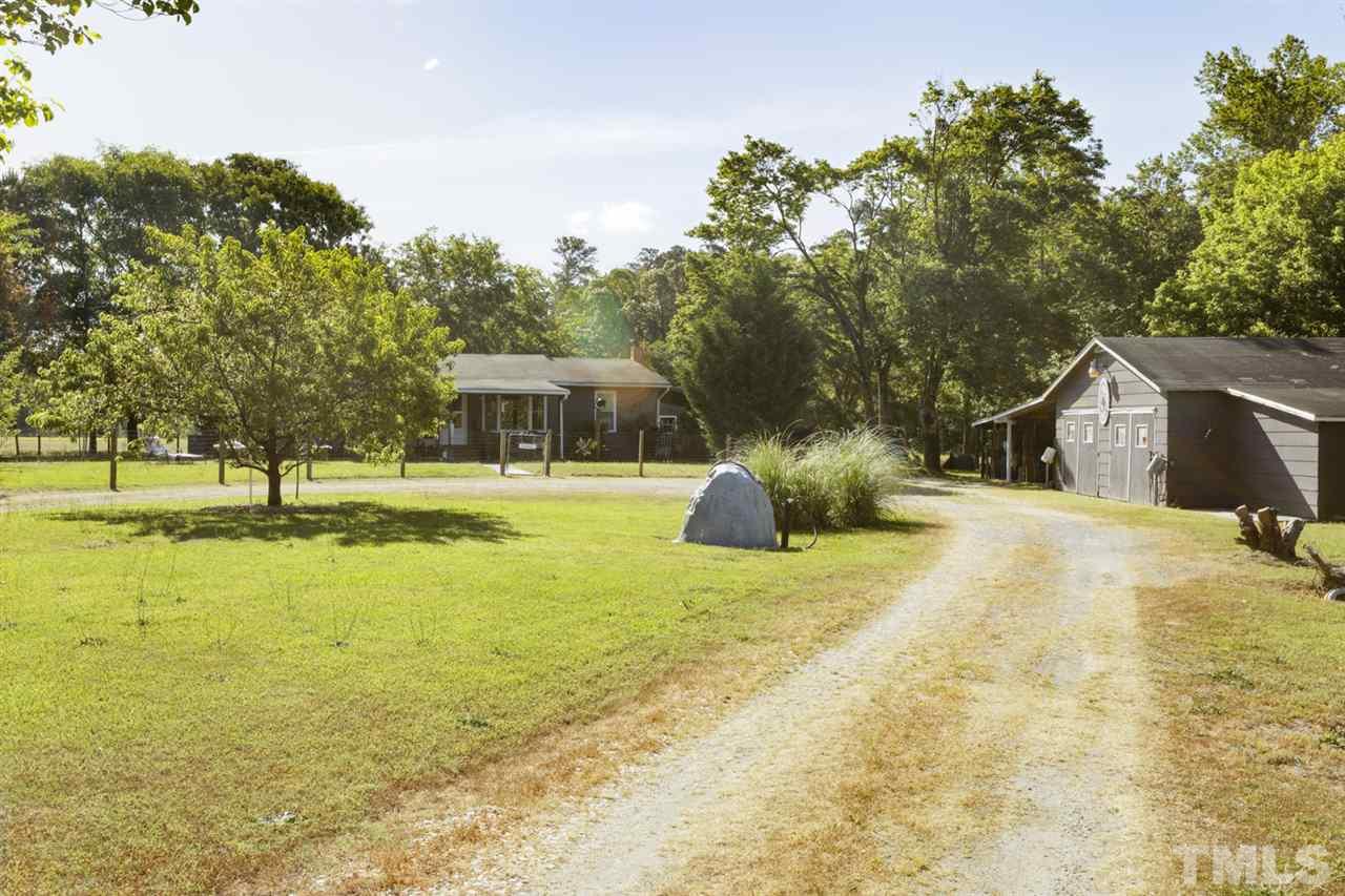 1481 Phillips Road Dunn, NC 28334 - Photo 2 of 30 a swimming pool view with a outdoor space