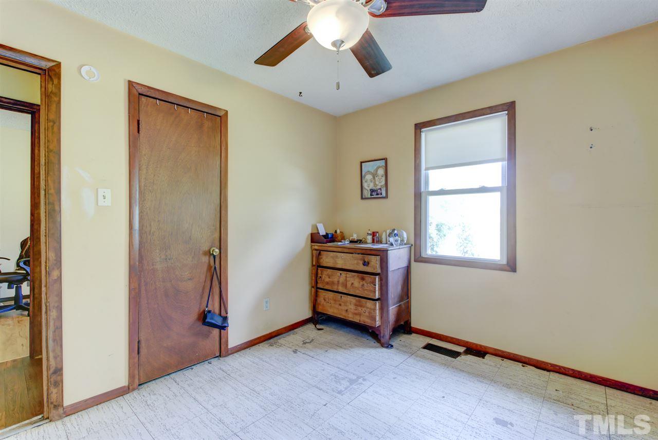1481 Phillips Road Dunn, NC 28334 - Photo 23 of 30 a view of room with window and ceiling fan