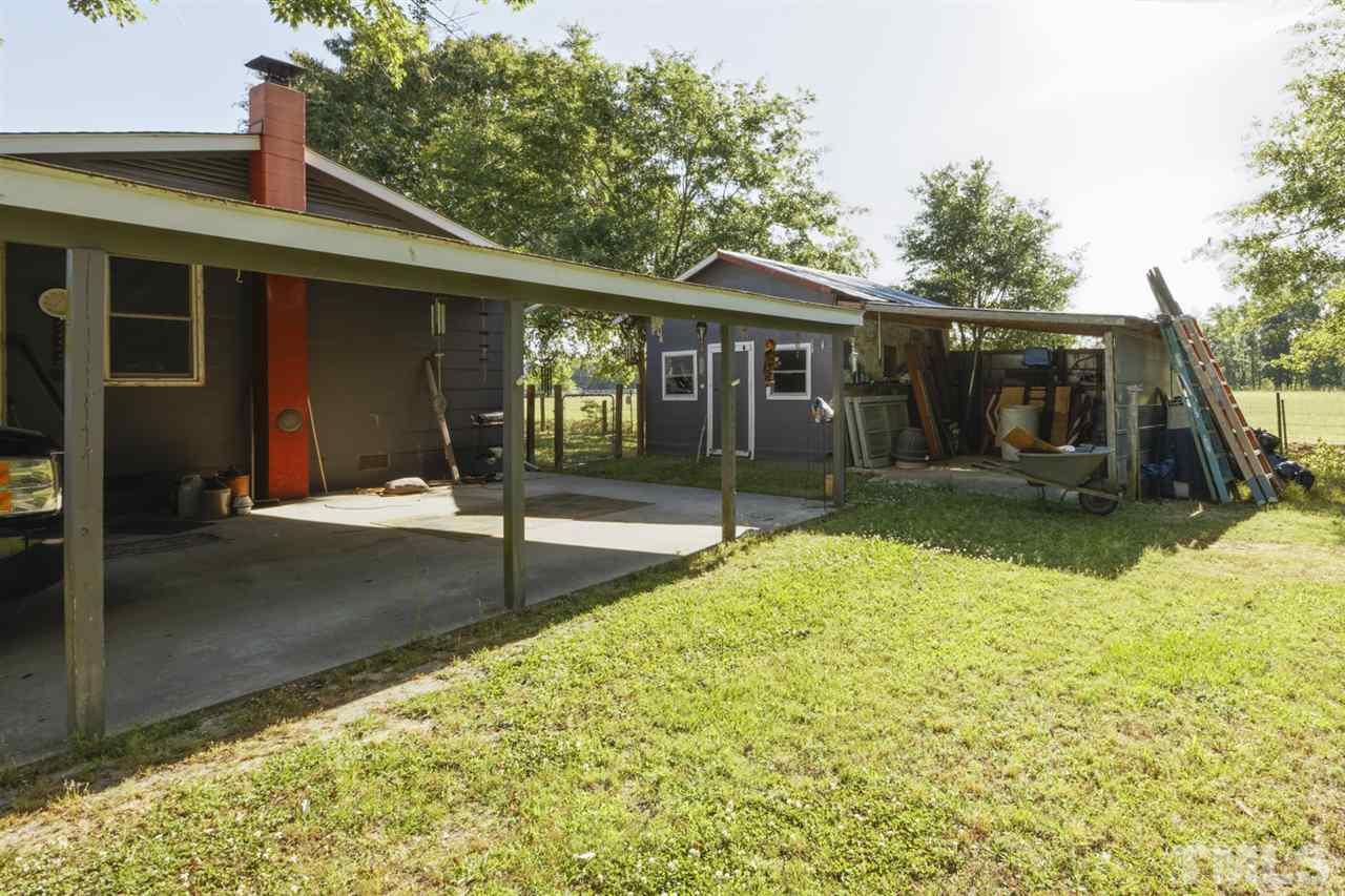 1481 Phillips Road Dunn, NC 28334 - Photo 28 of 30 a front view of a house with a yard