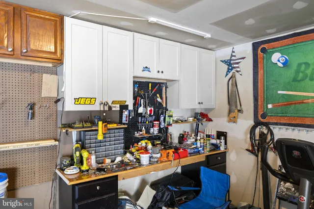 a view of a yard with snow on the road