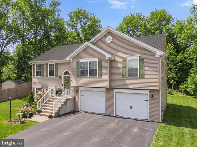 a view of a table and chairs on the roof deck