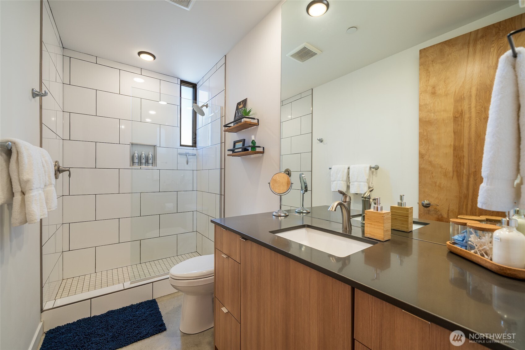 23648 Northwest Cliffe Pointe Road, Unit 10C Quincy, WA 98848 - Photo 12 of 26 a bathroom with a sink a toilet and shower