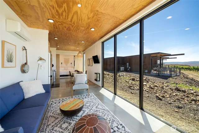 a living room with furniture and a table