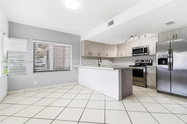 $242,000 | 4705 Southwest 62nd Avenue, Unit 104, Davie, FL 33314