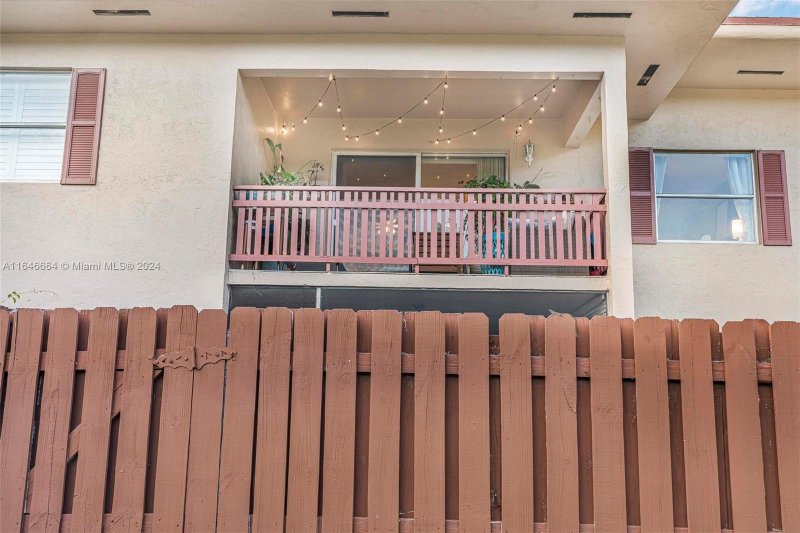 11249 Southwest 88th Street, Unit 203G Miami, FL 33173 - Photo 21 of 37 a view of a wooden floor with a window