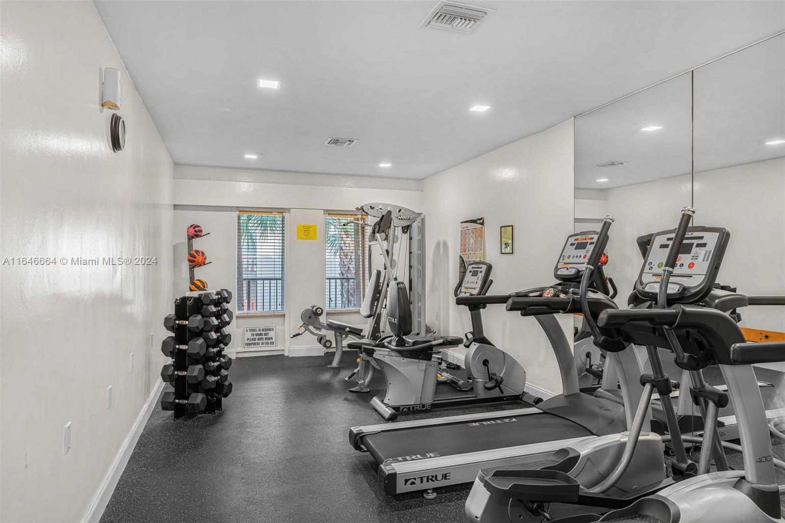 11249 Southwest 88th Street, Unit 203G Miami, FL 33173 - Photo 25 of 37 a view of a room with gym equipment