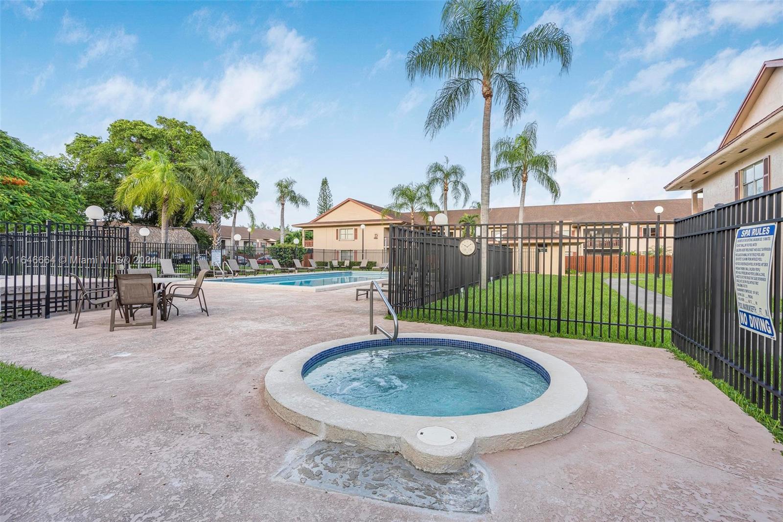 11249 Southwest 88th Street, Unit 203G Miami, FL 33173 - Photo 29 of 37 a house view with a outdoor space