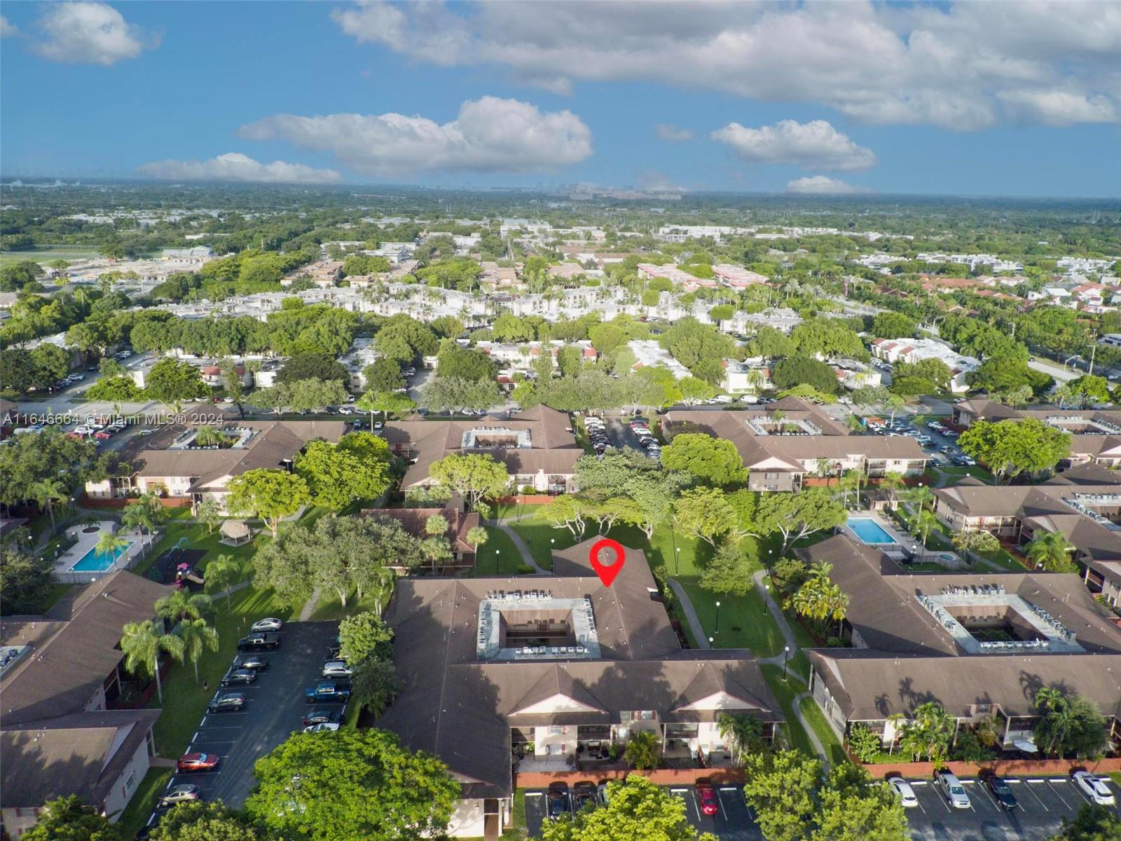 11249 Southwest 88th Street, Unit 203G Miami, FL 33173 - Photo 30 of 37 an aerial view of multiple house