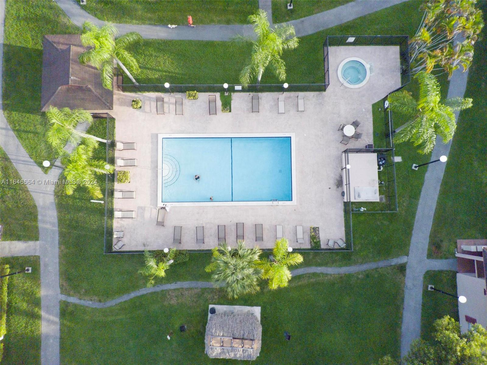 11249 Southwest 88th Street, Unit 203G Miami, FL 33173 - Photo 33 of 37 an aerial view of a house