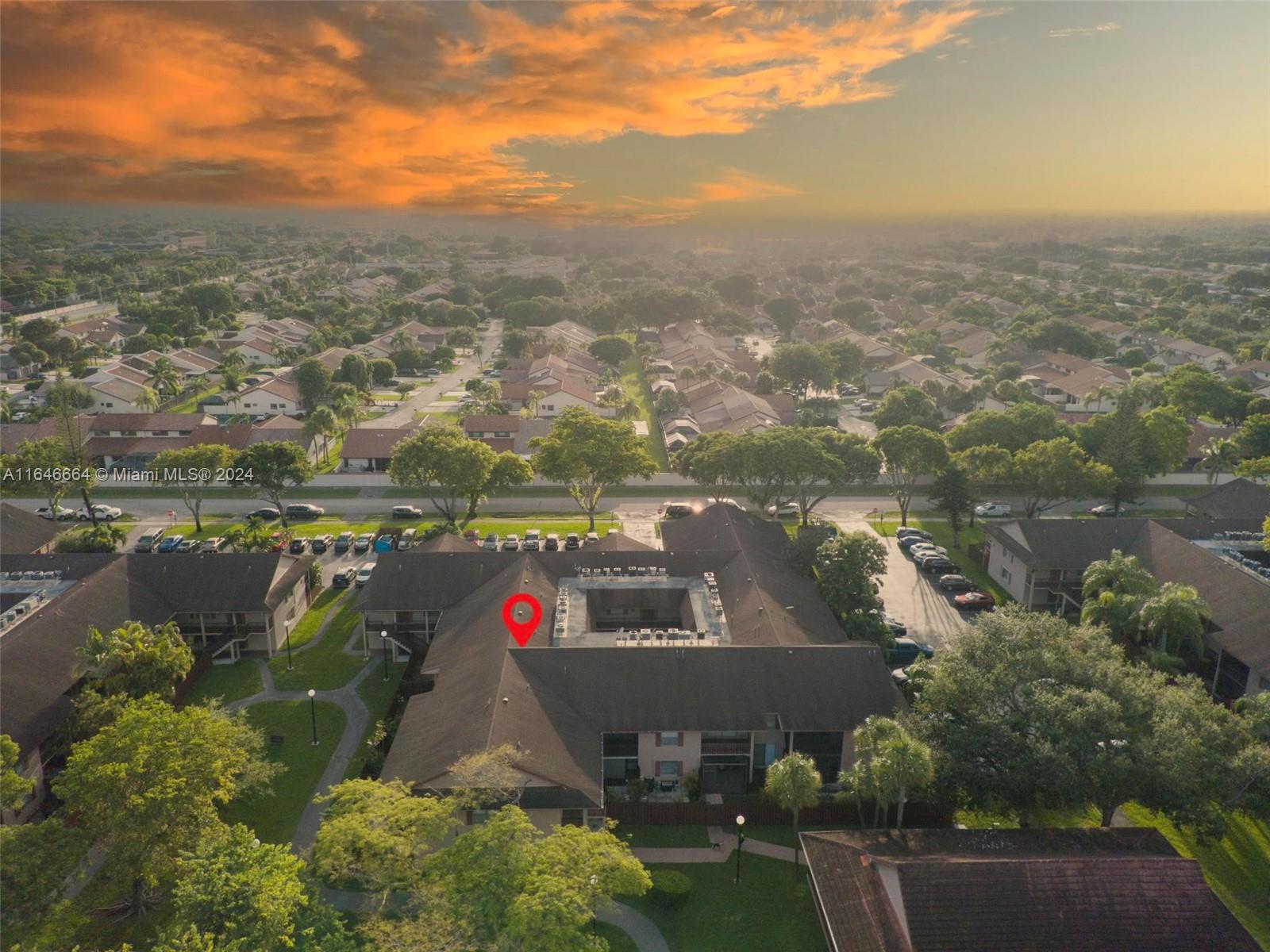 11249 Southwest 88th Street, Unit 203G Miami, FL 33173 - Photo 37 of 37 an aerial view of residential houses with outdoor space and river