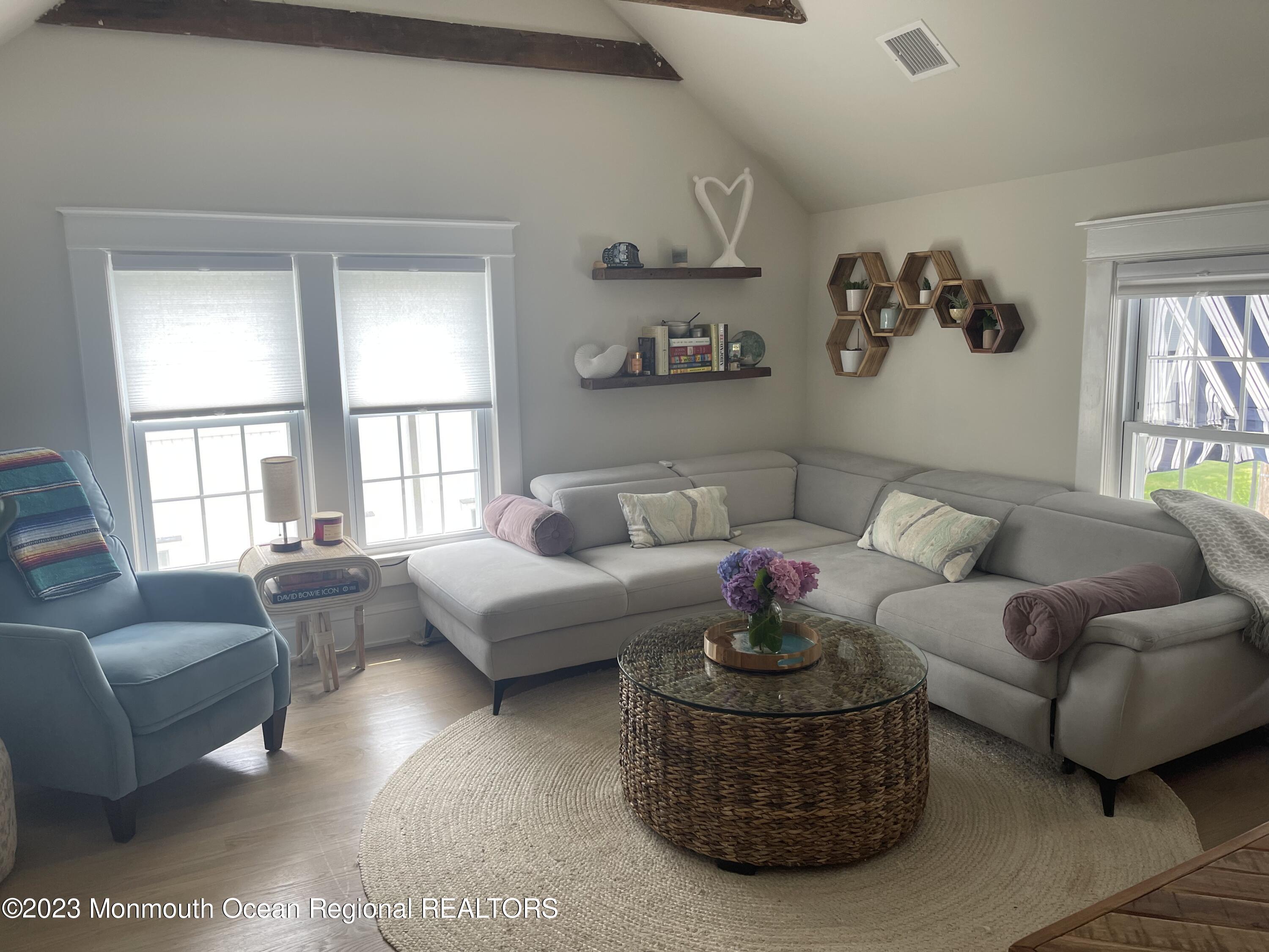 2112 Edgewood Place Spring Lake, NJ 07762 - Photo 15 of 24 a living room with furniture and a large window