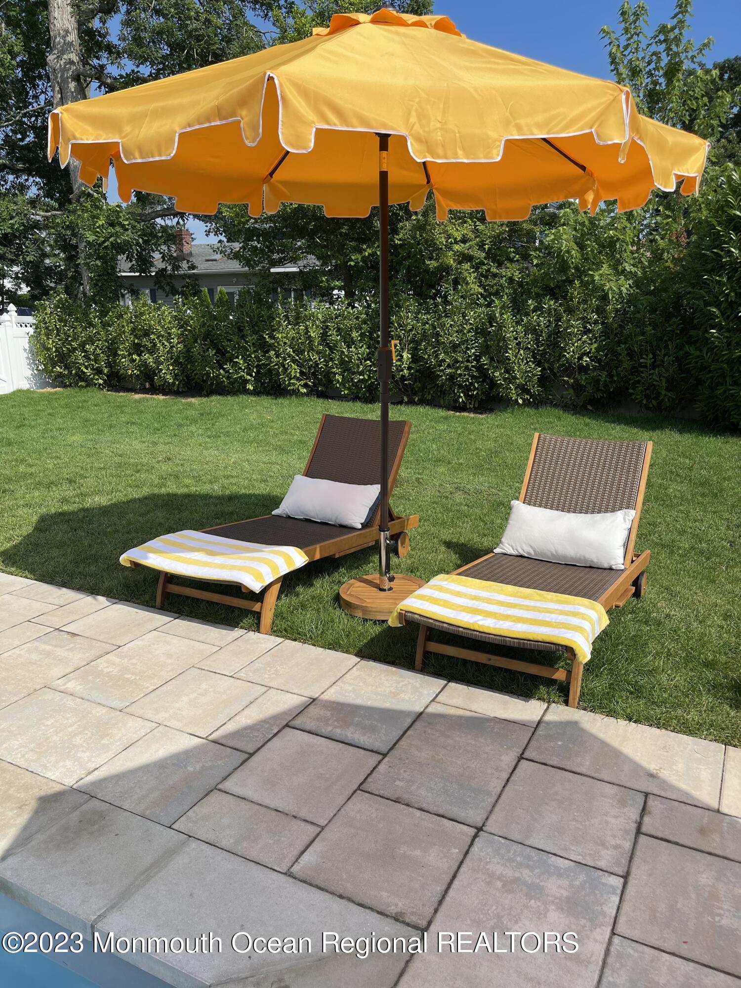 2112 Edgewood Place Spring Lake, NJ 07762 - Photo 16 of 24 a view of a patio with a yard