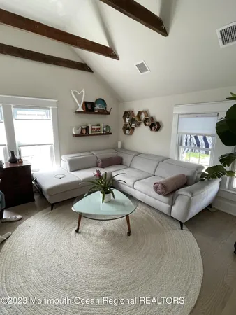 a living room with furniture and a couch