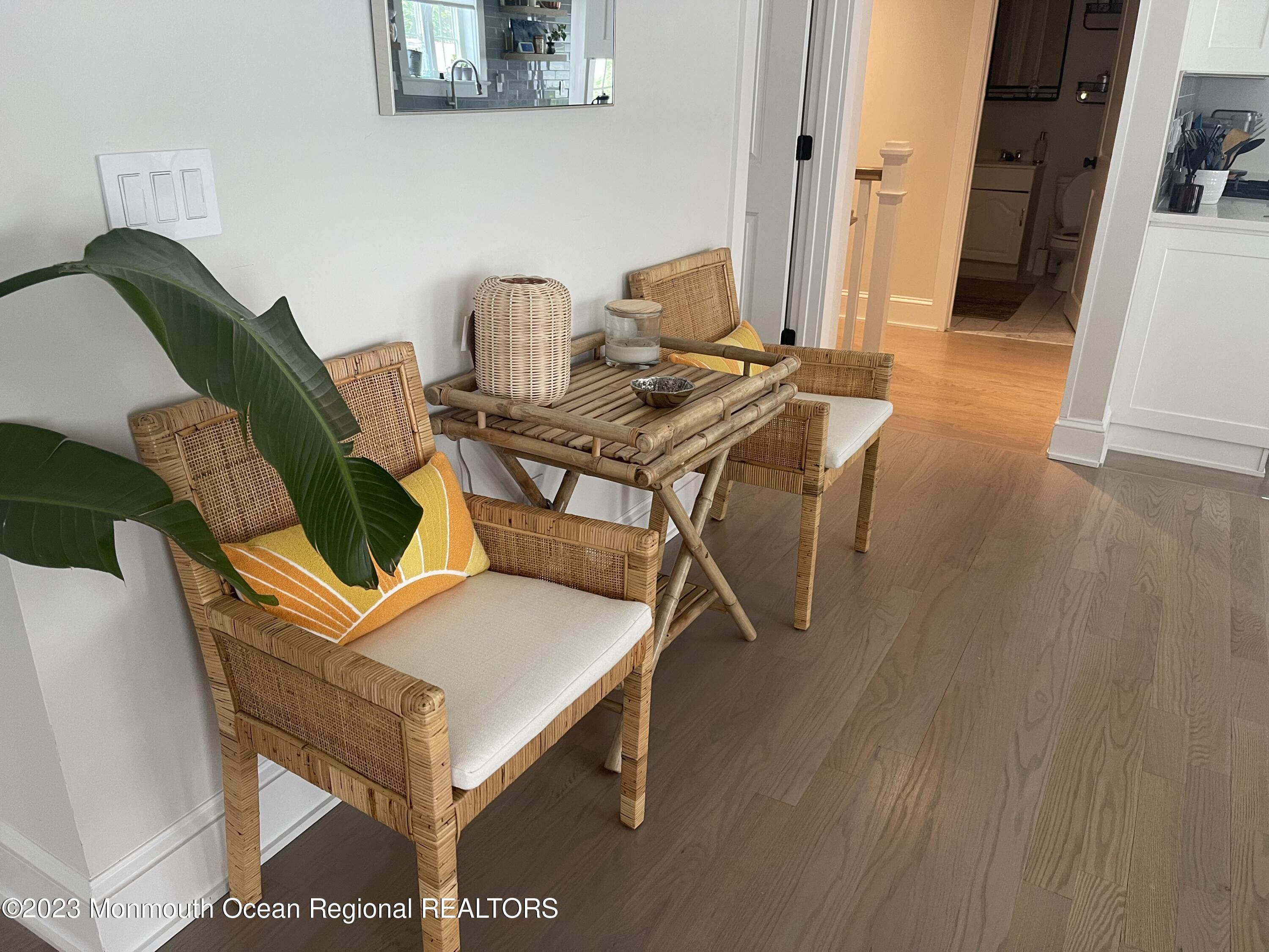 2112 Edgewood Place Spring Lake, NJ 07762 - Photo 22 of 24 a living room with furniture and a table