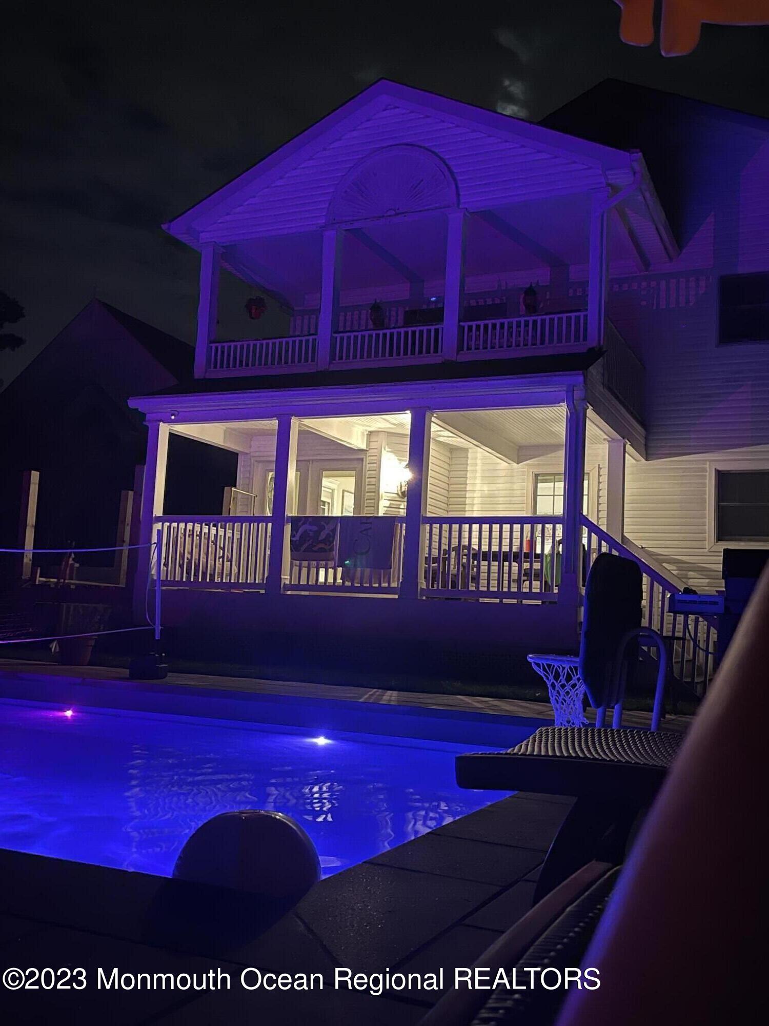 2112 Edgewood Place Spring Lake, NJ 07762 - Photo 8 of 24 a view of swimming pool with red walls