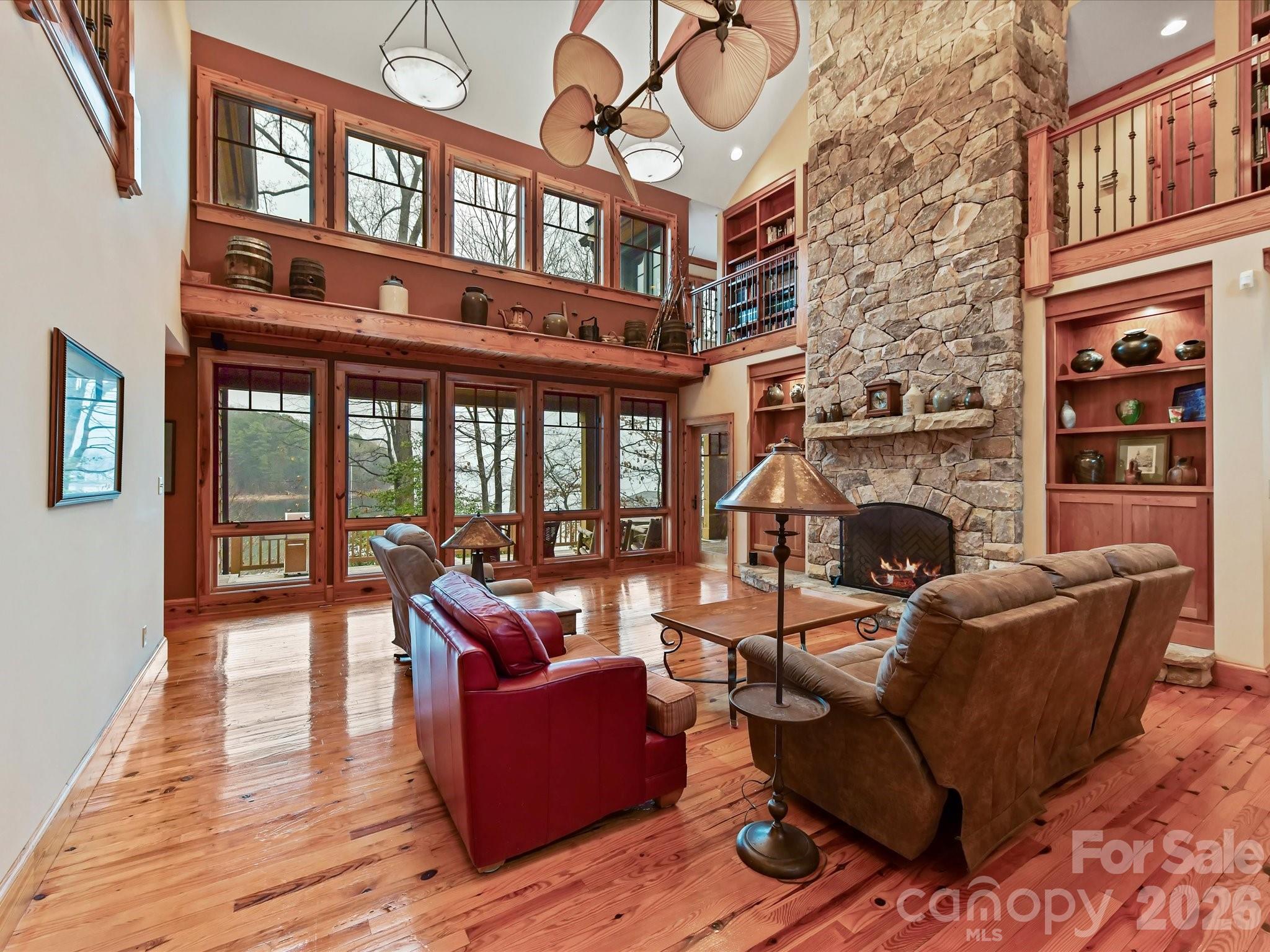 4312 Hazel Street Terrell, NC 28682 - Photo 17 of 45 a living room with fireplace furniture and a large window