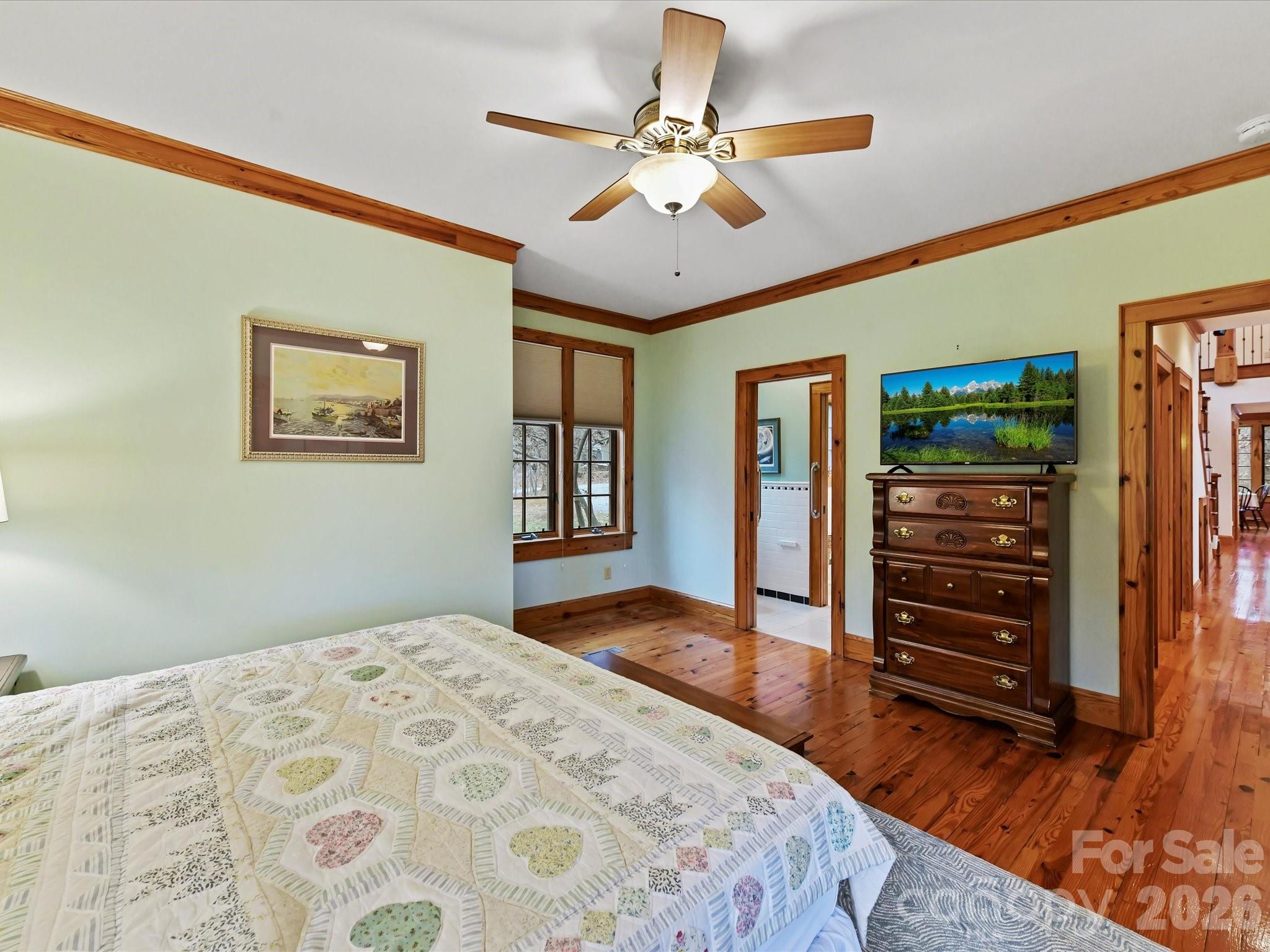 4312 Hazel Street Terrell, NC 28682 - Photo 19 of 45 a bedroom with a bed and wooden floor