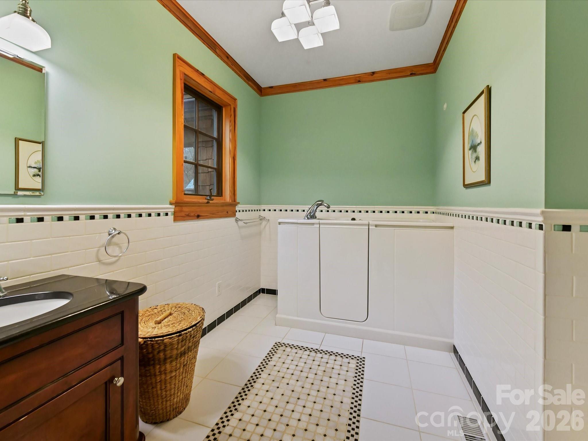 4312 Hazel Street Terrell, NC 28682 - Photo 20 of 45 a bathroom with a sink a toilet and mirror